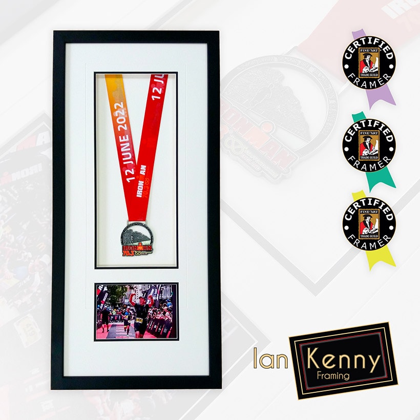 Iron Man competition medal and photograph