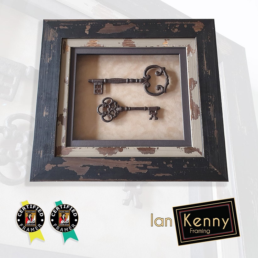 A framed set of ornate replica keys