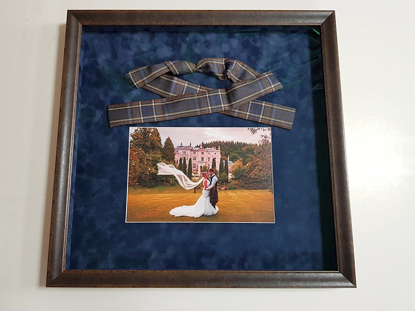 Complete framed wedding knot with a wedding photograph